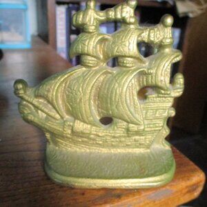 Single small brass ship bookend